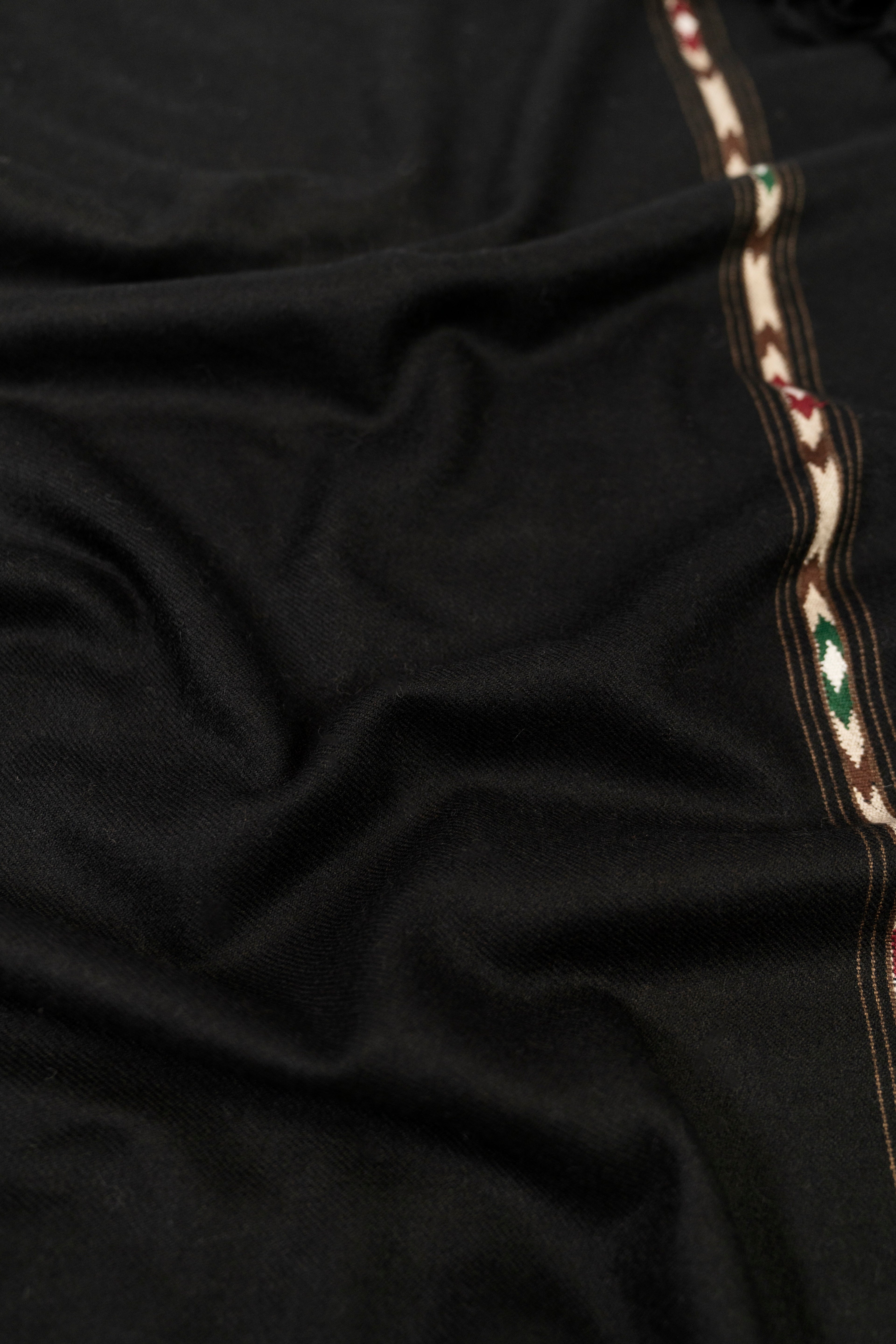 Black handwoven lamb wool blanket scarf detail shot