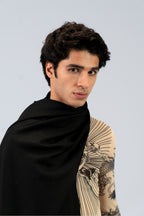 Black heavyweight lamb wool shawl close-up portrait on male model with tattoo sleeve