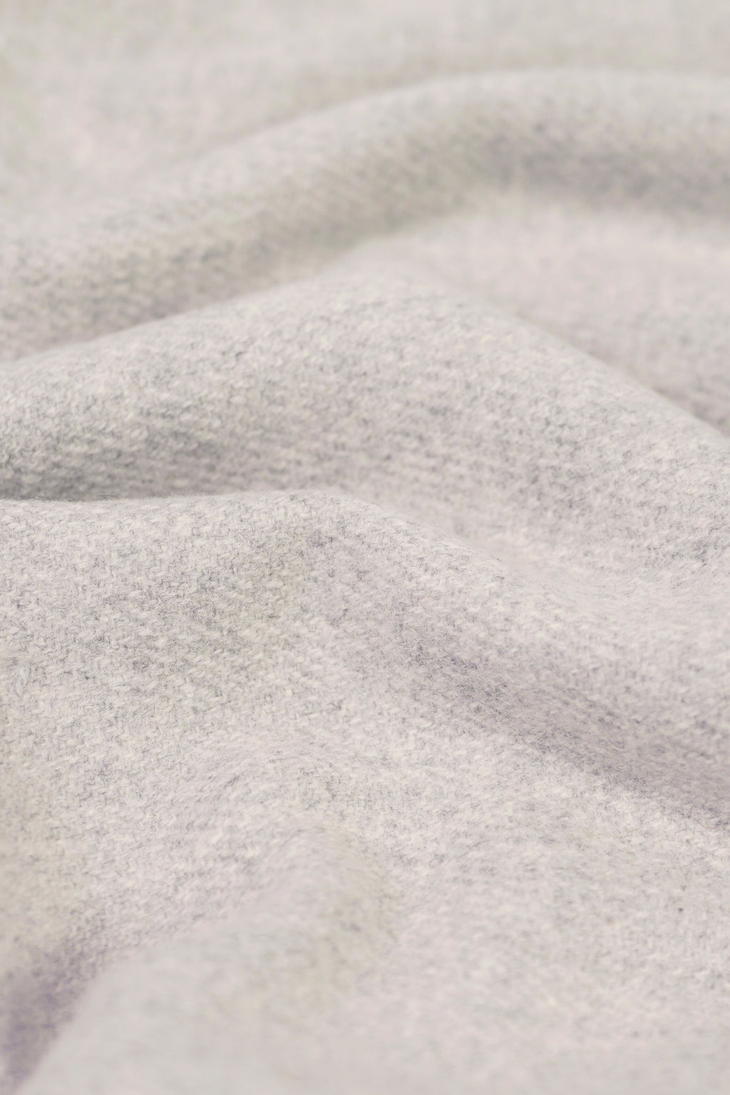 Silver heavyweight lamb wool shawl close-up of handwoven fabric weave texture