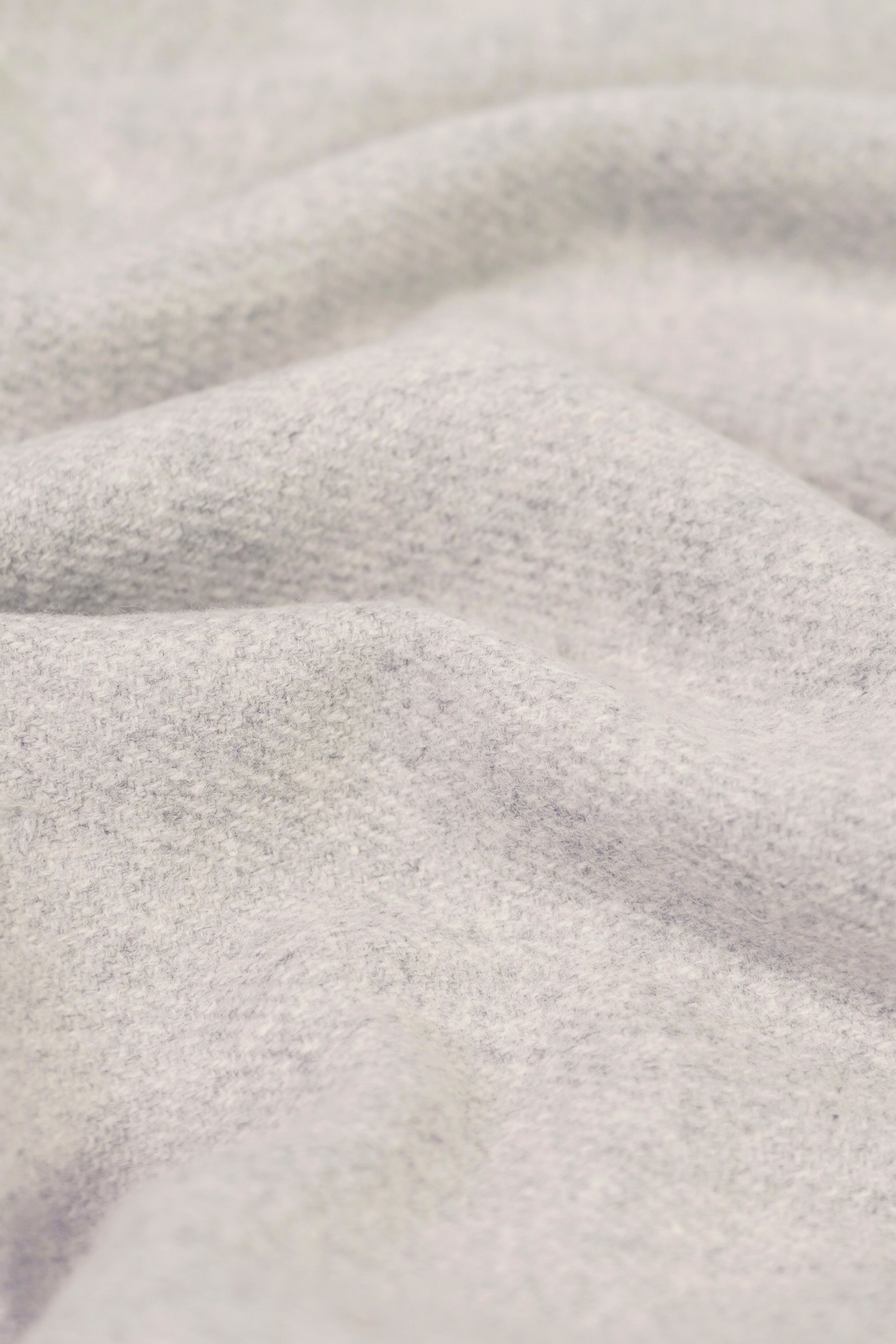 Silver heavyweight lamb wool shawl close-up of handwoven fabric weave texture