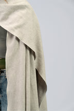 Silver heavyweight lamb wool shawl mid-body close-up showing vertical drape and edge