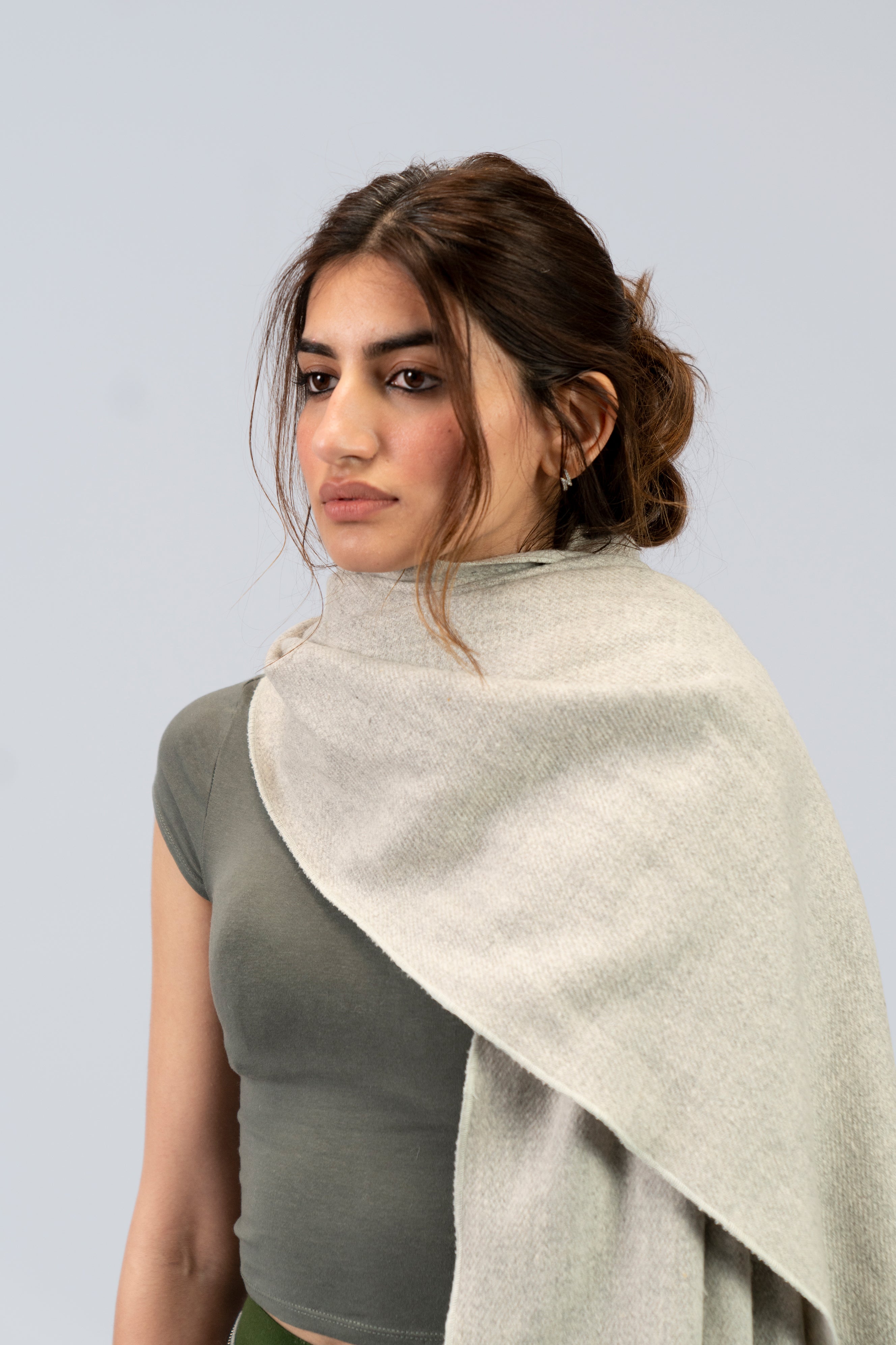 Silver heavyweight lamb wool shawl close-up around neck and shoulders of female model