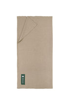 Off-white heavyweight lamb wool shawl folded flat with SHAAL label, full length