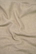 Beige heavyweight lamb wool shawl close-up of handwoven fabric weave