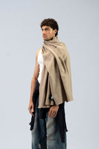 Beige heavyweight lamb wool shawl on male model in tank top, three-quarter side view