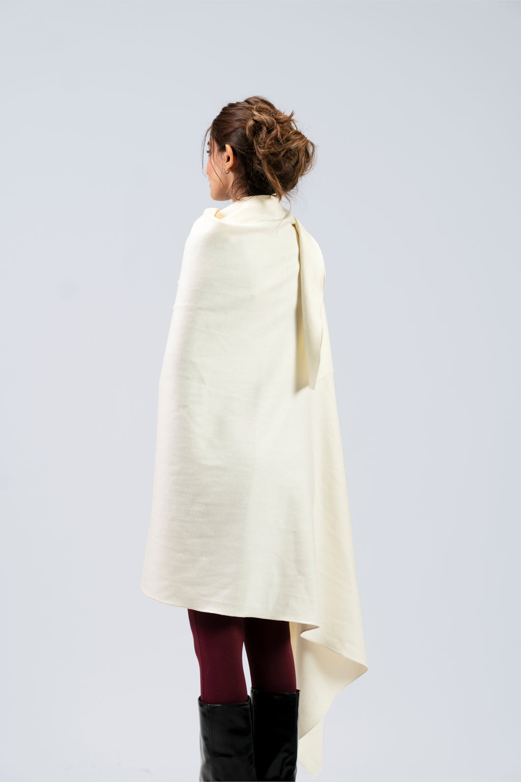 Off-white heavyweight lamb wool shawl from behind on female model, back view