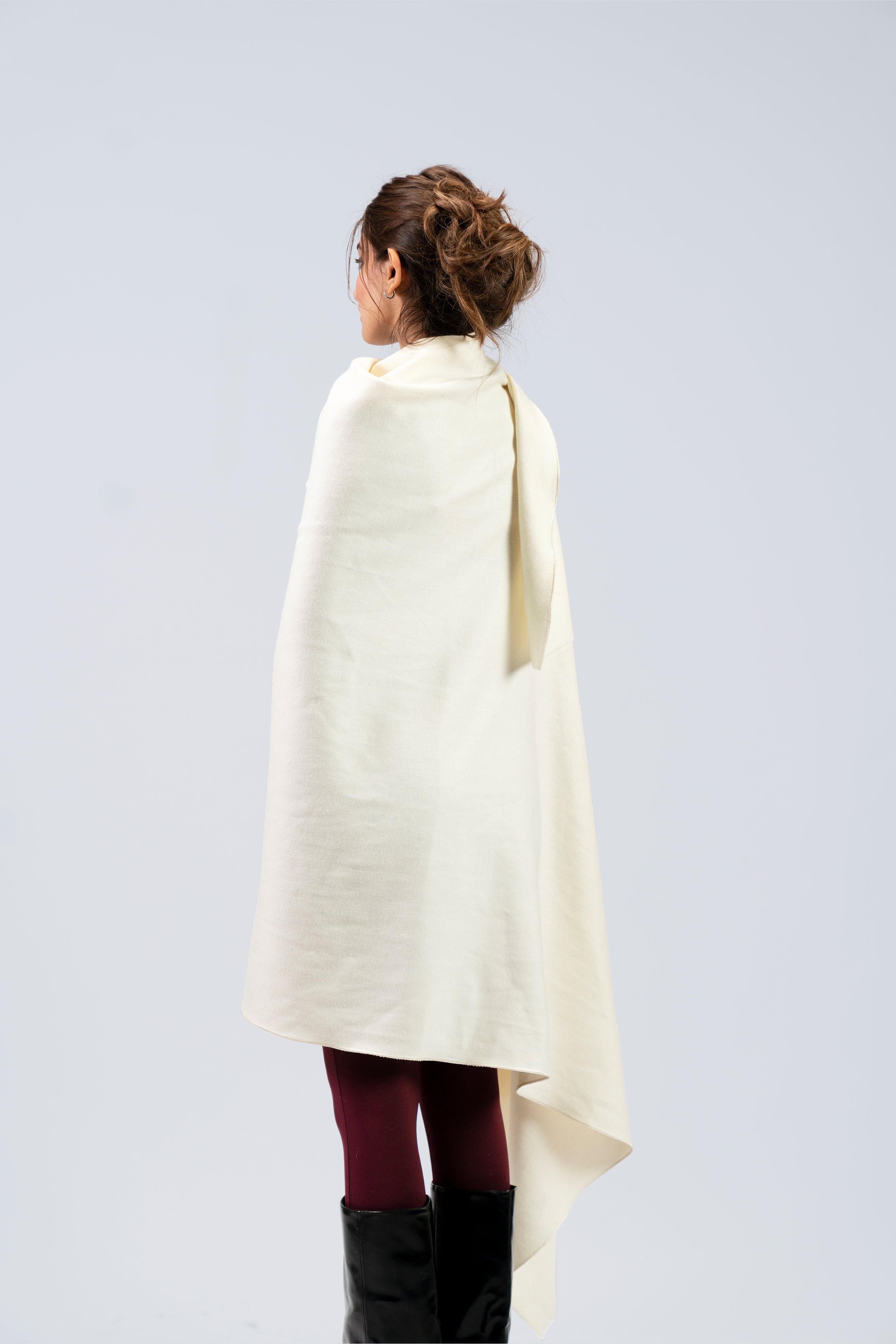 Off-white heavyweight lamb wool shawl from behind on female model, back view