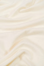 Off-white heavyweight lamb wool shawl close-up of handwoven fabric weave