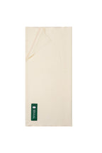 Off-white heavyweight lamb wool shawl folded flat with SHAAL label, full-length view